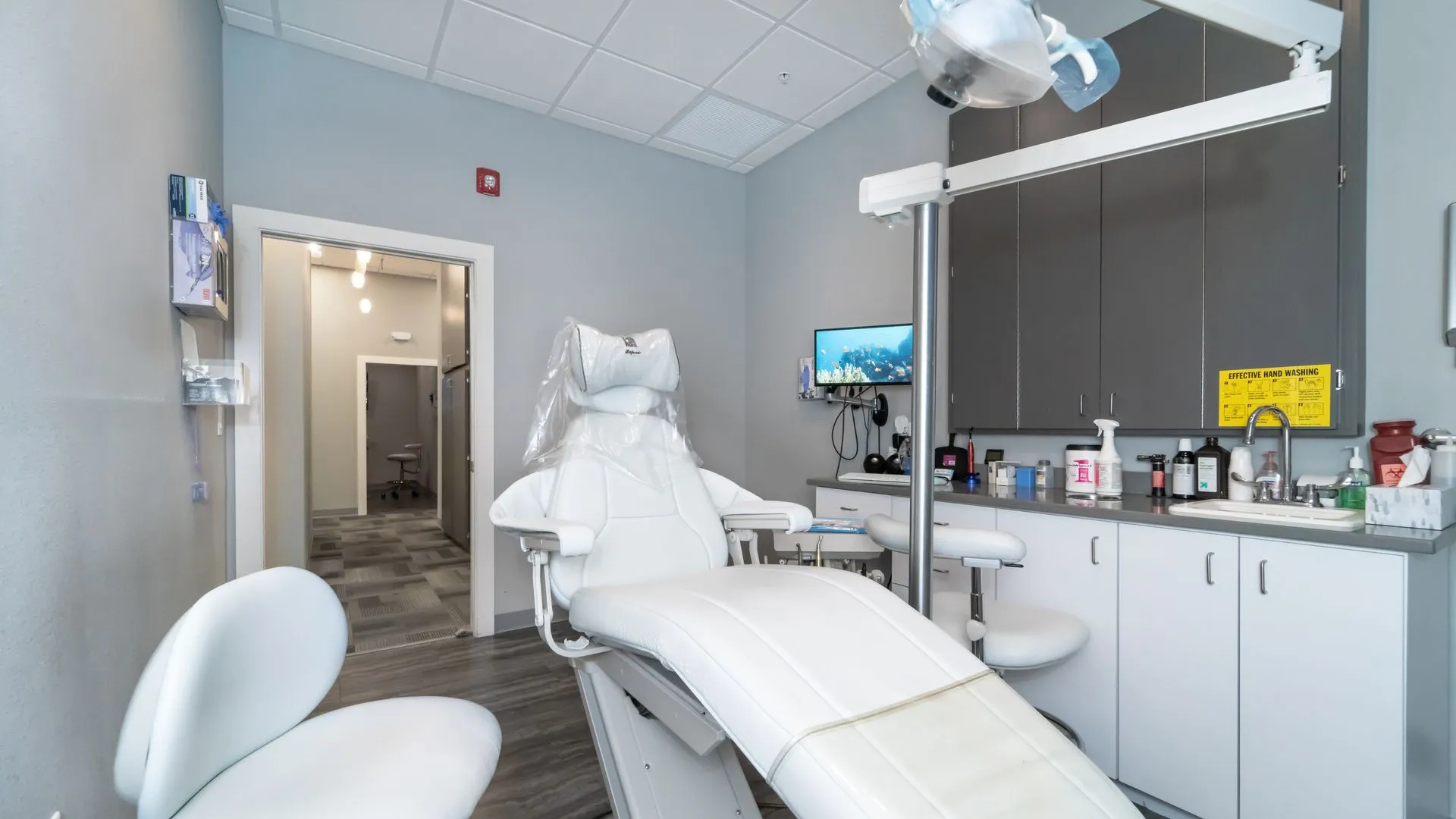 Dental operatory with reclining chair and clinical cabinetry