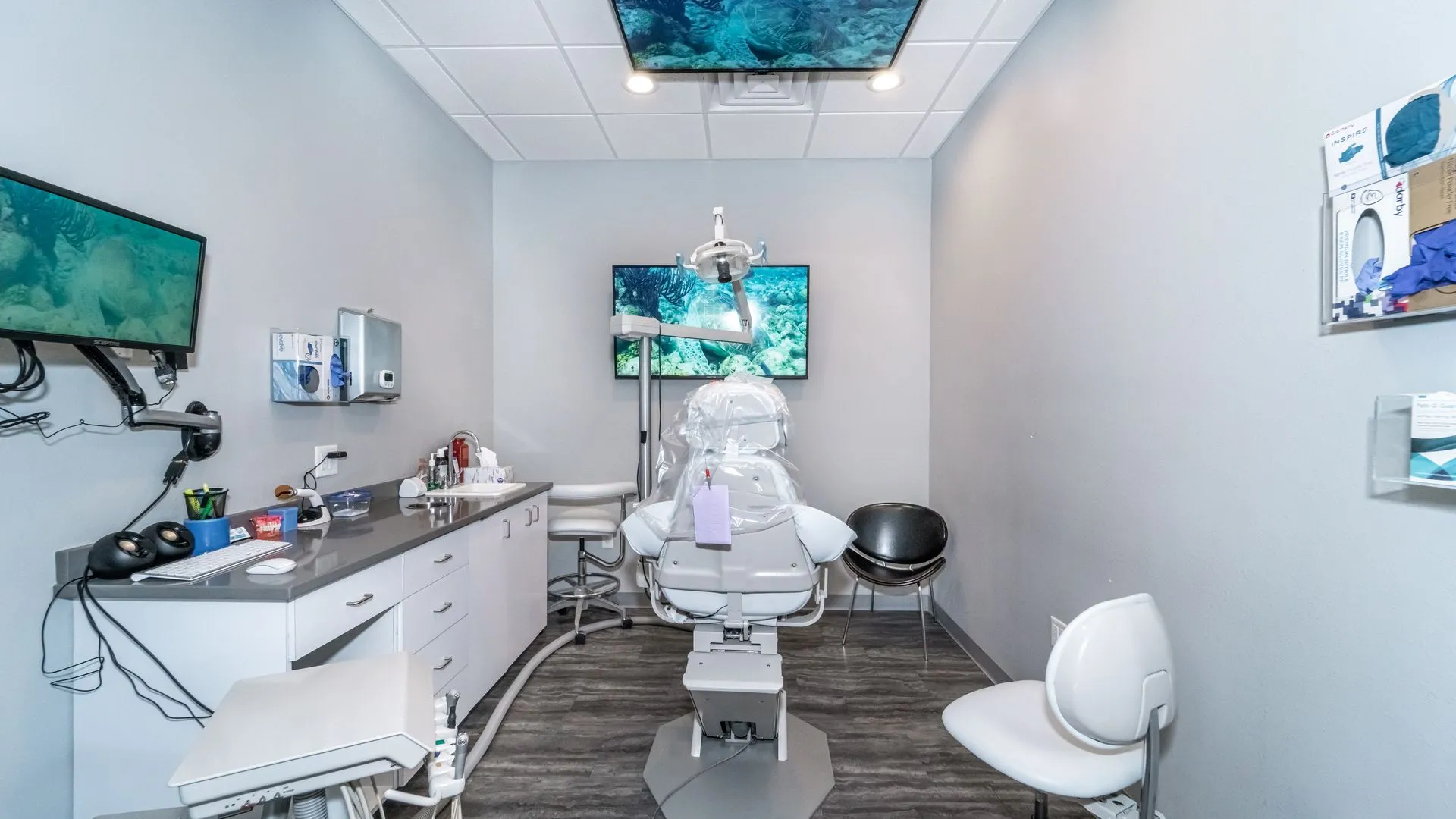 Spacious dental treatment room with modern equipment